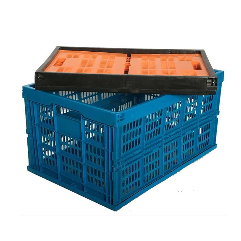 A folded plastic crate stack on an unfolded one.