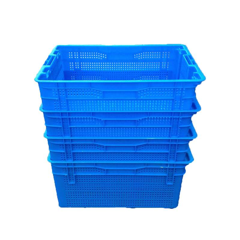 Four plastic crates are nested into each other.