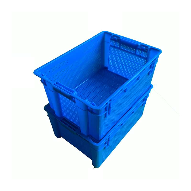 A blue reversible plastic crate stack on another.