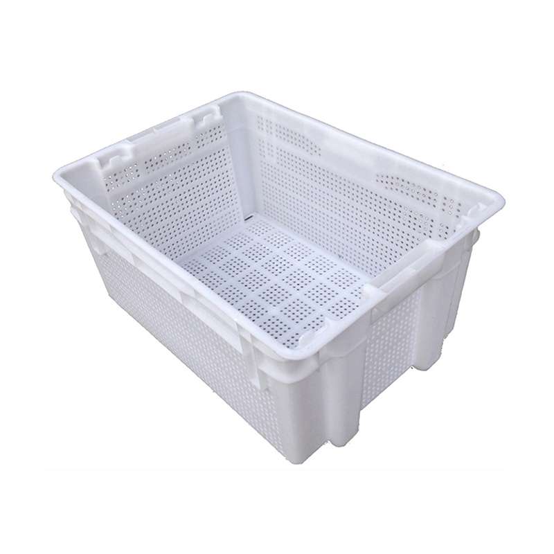A white reversible plastic vegetable crate.