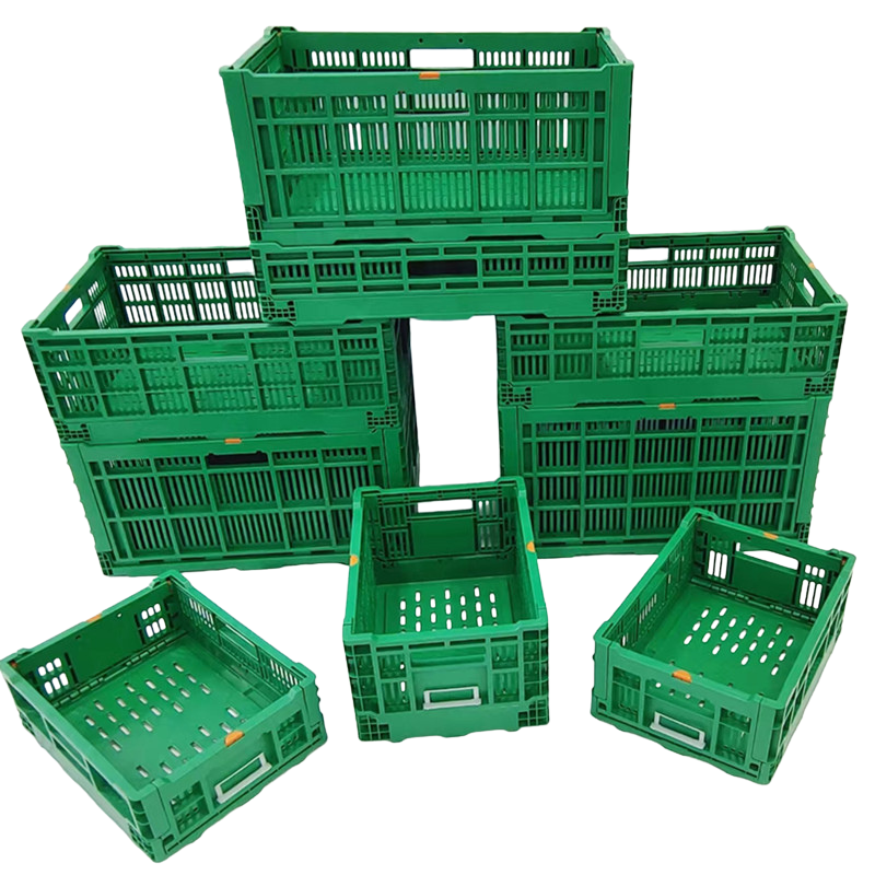 Green Plastic Collapsbile crates are stacked.