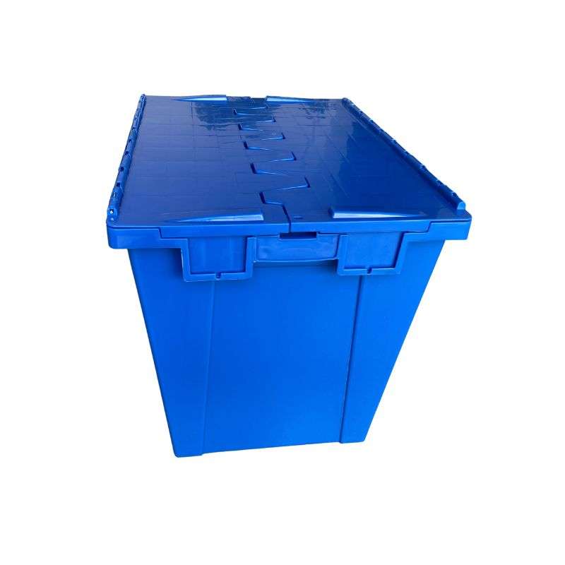 Short side of a large blue plastic moving box.