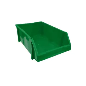un bac de rangement pour pièces vert